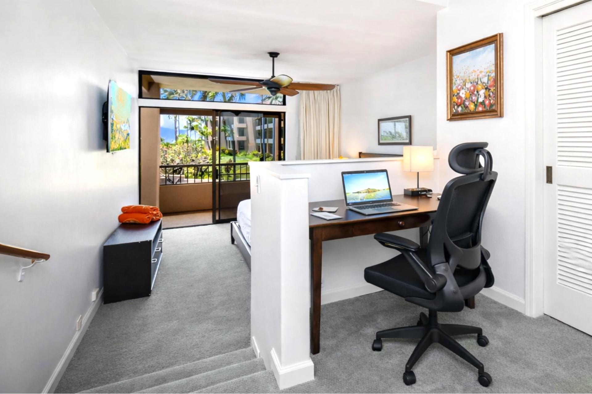 A dedicated desk and chair in your primary suite make remote work simple, keeping productivity close to your personal space.