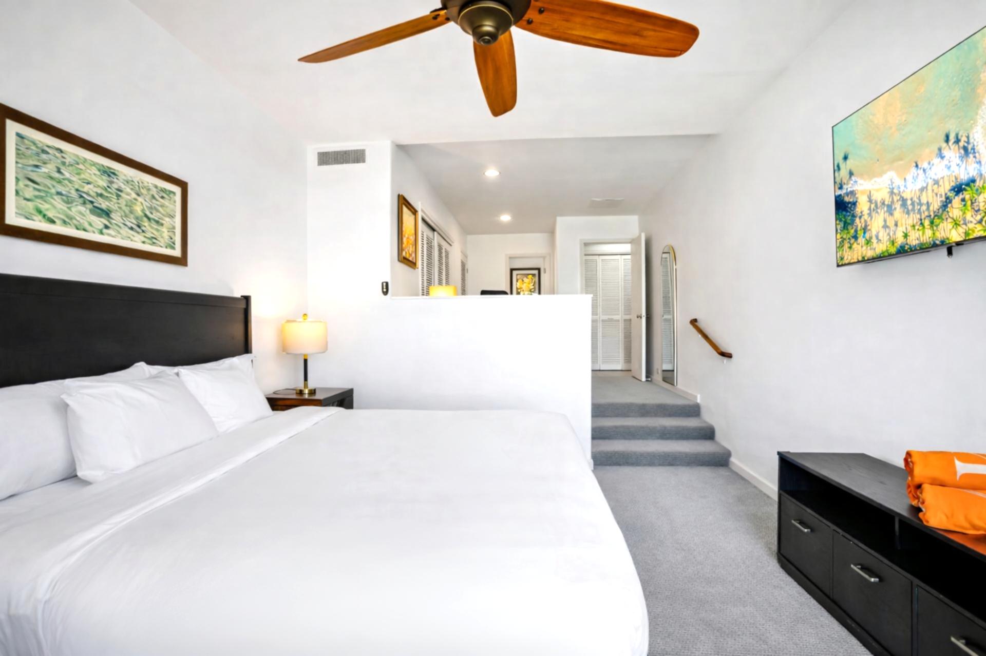 From peaceful sleeps to productive moments, this airy suite shines with a lanai view and crisp, modern style    