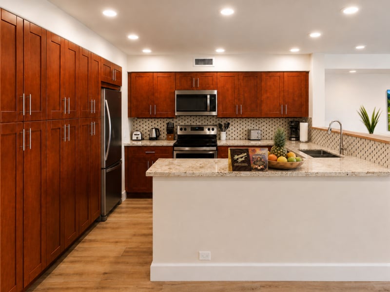 Granite counters wrap the range and sink, with a wide peninsula giving you room to spread out while you cook.