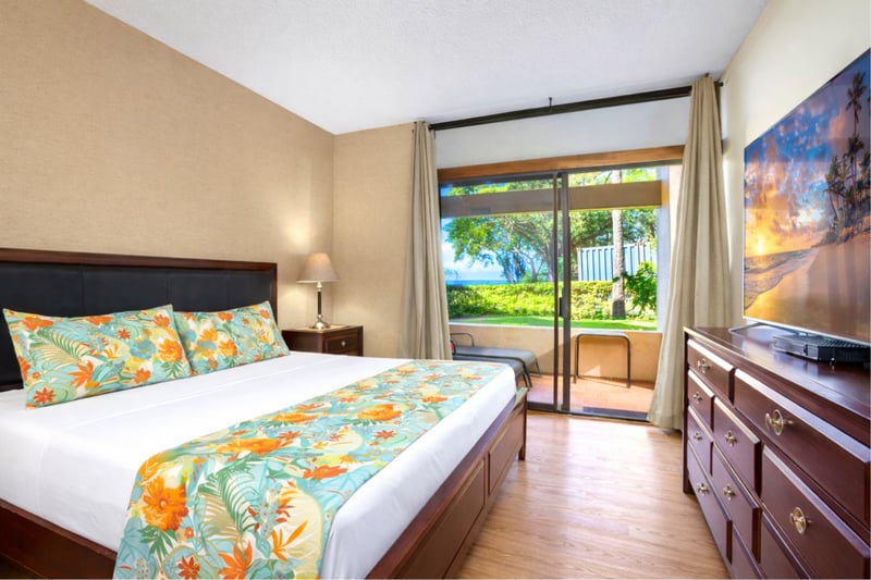 Slide into island slumber with floral flair, a breezy lanai, garden glimmers, and space to unpack your paradise