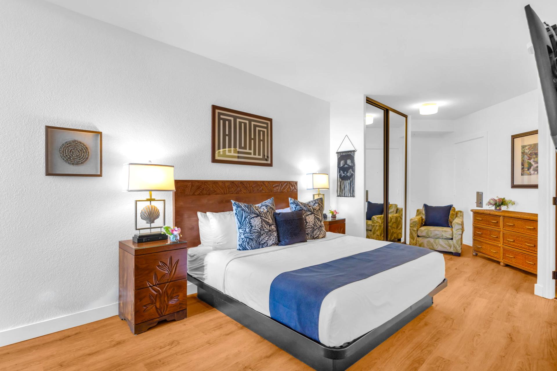 The beautifully designed primary bedroom features premium bedding and a serene, restful ambiance