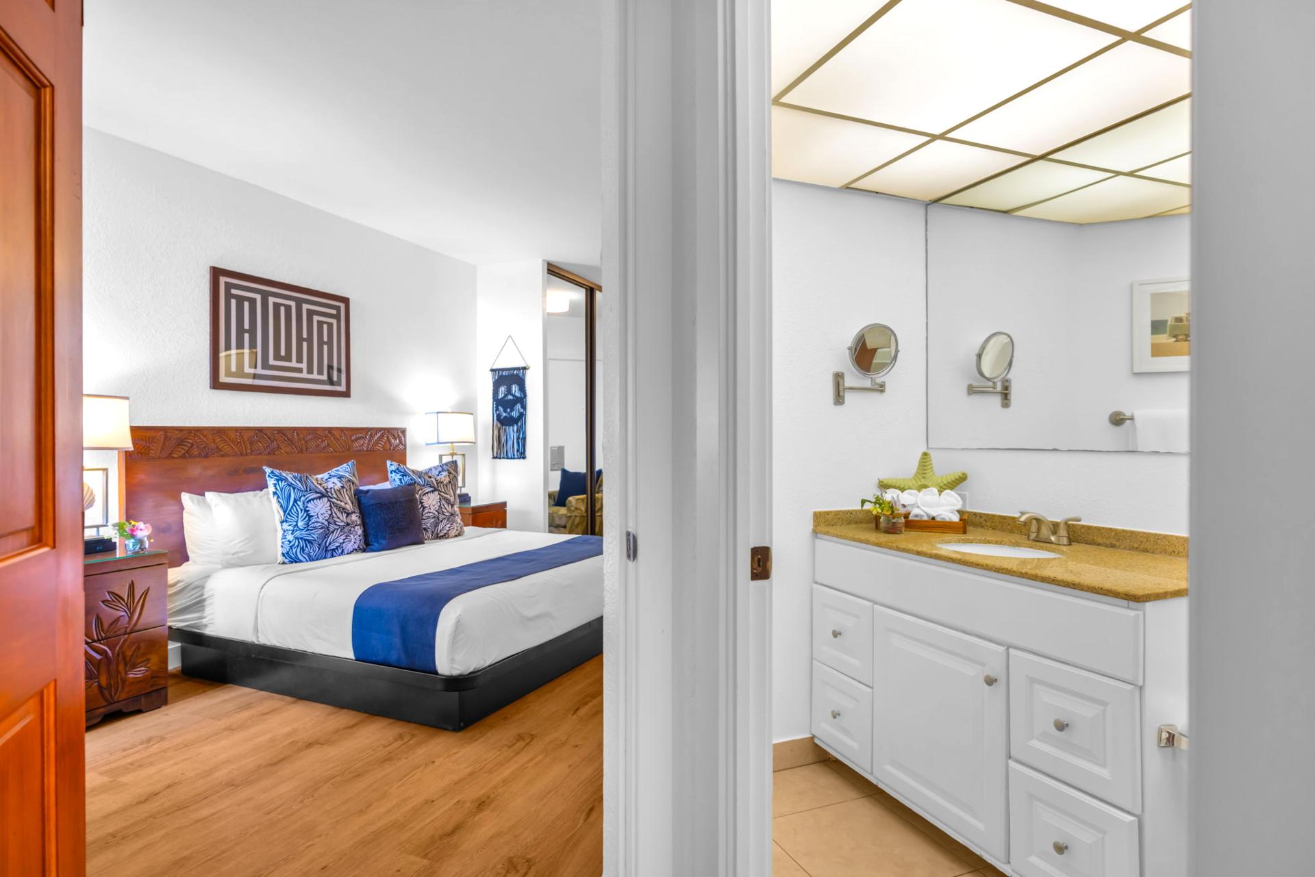 The ensuite bathroom adds privacy to the primary bedroom