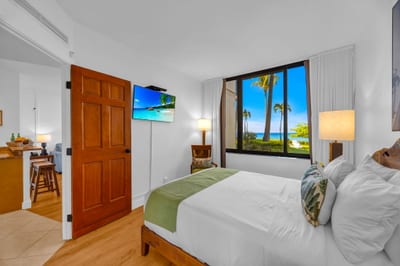 Bright and inviting, the guest bedroom is a tranquil haven with elegant touches KS-104