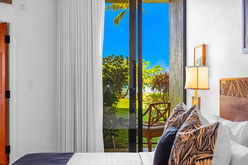 Lush garden and ocean views greet you each morning from the private lanai