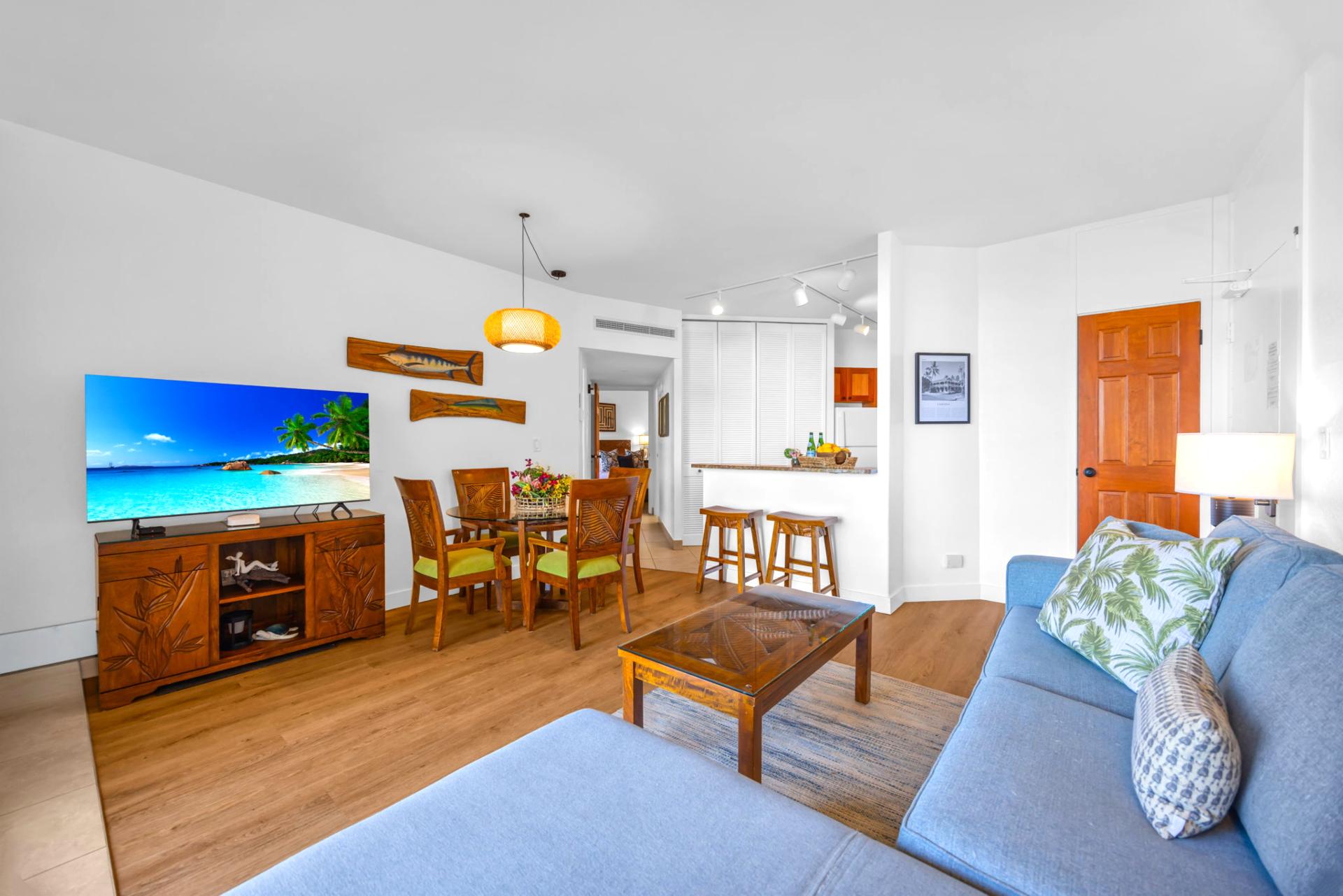 Thoughtfully designed with modern coastal decor, the living area invites you to unwind