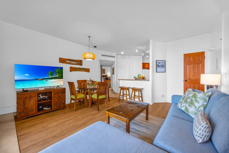 Thoughtfully designed with modern coastal decor, the living area invites you to unwind