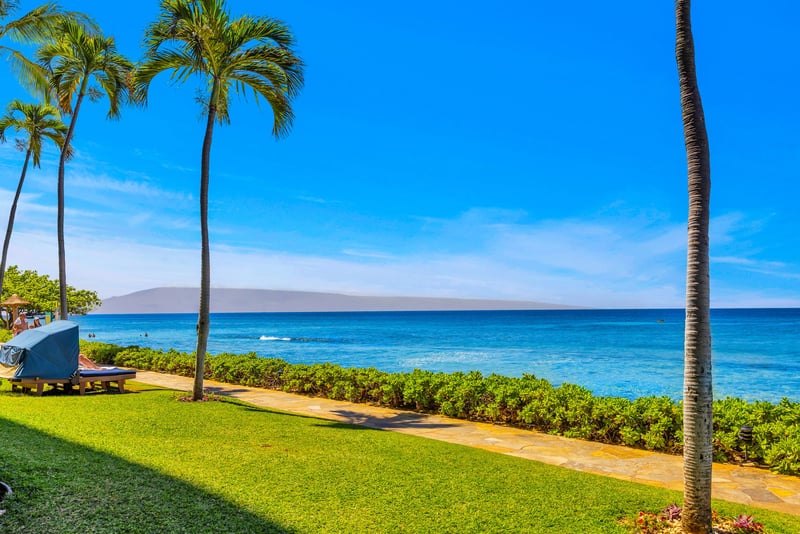 Stunning panoramic ocean views framed by swaying palms set the tone for your Hawaiian paradise KS-104
