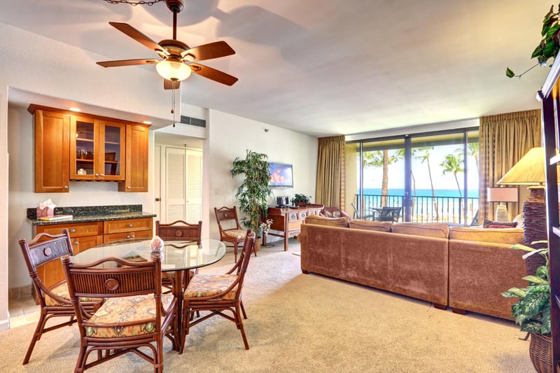 Looking out from kitchen to dining table and living room KS-258