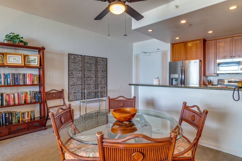 Tropical wood tones and breezy fans set the stage for cozy meals, beachy chats, and carefree island-day planning KS-258