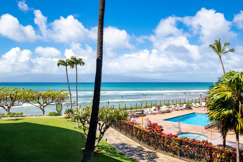 With every glance, Maui stuns—ocean waves, swaying palms, and poolside bliss just steps from your retreat   