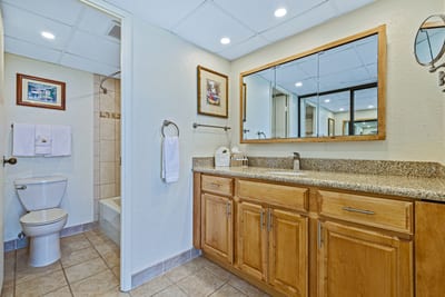 Granite finishes and gentle light make every morning feel fresh.