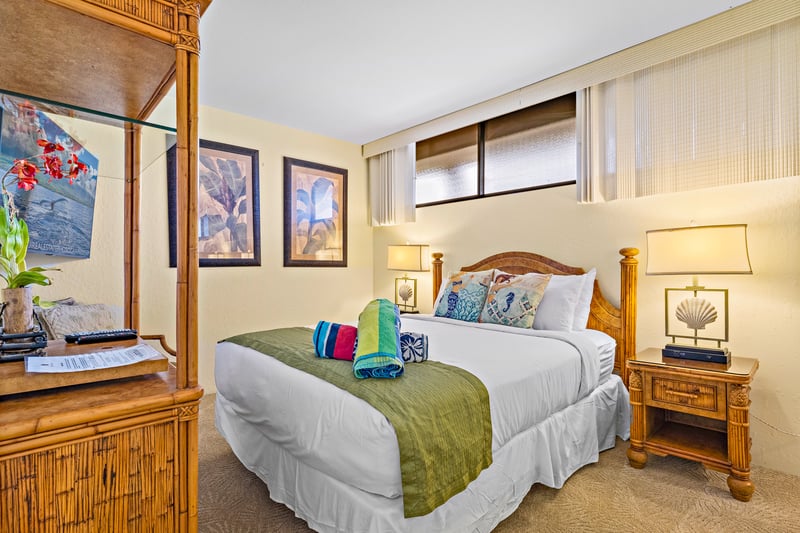 This charming guest room blends island ease with warm tones, a private lanai breeze, and closet space to unwind KS-535