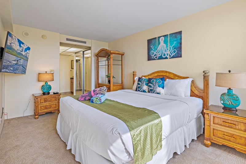 Bright and breezy, this master retreat features ocean hues, a private lanai, and space to unwind in tropical style KS-535