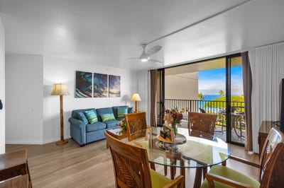 Savor ocean glimpses from the dining table or stretch out on the sofa sleeper in this breezy living space with lanai access.