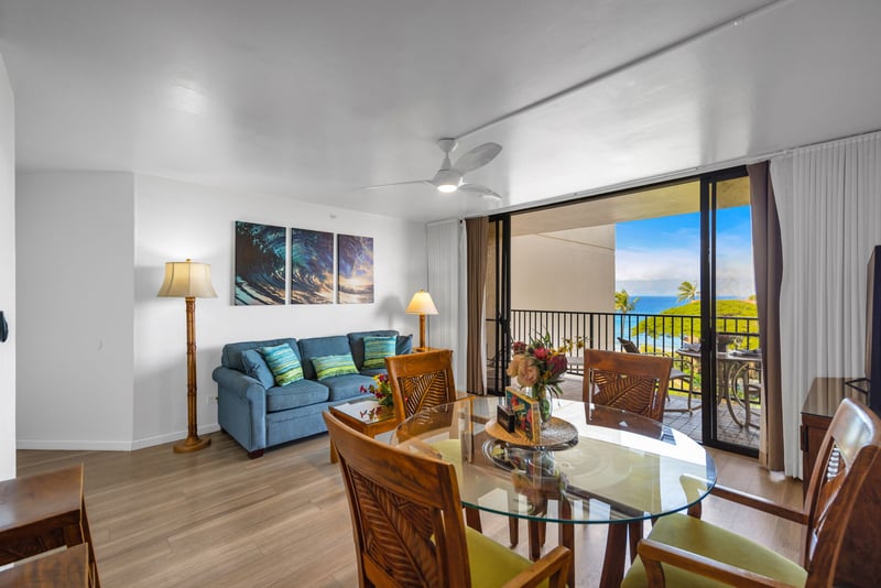Savor ocean glimpses from the dining table or stretch out on the sofa sleeper in this breezy living space with lanai access.