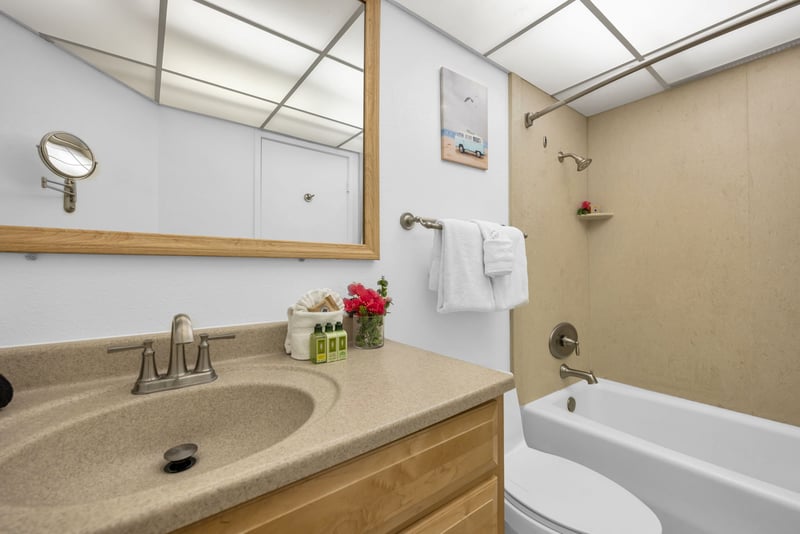 Convenient tub and shower combo with fresh linens