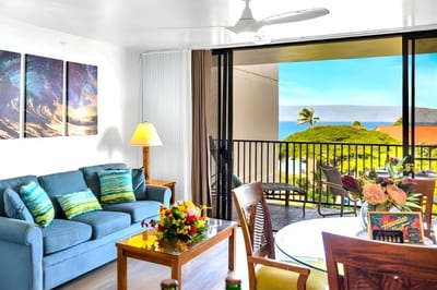 Indoor-outdoor flow meets oceanview charm in this vibrant living space, where a sofa sleeper and dining area open to the breezy lanai.