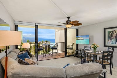 Unwind in coastal charm where plush seating meets sunset skies and sea views stretch into your dreams