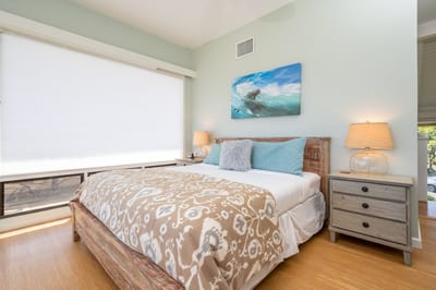 This inviting space brings together natural light, cozy textures, and classic wood accents for peaceful rest KBV-12B3