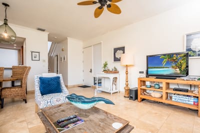 Coastal colors and inviting decor bring warmth and relaxation to this bright and airy living area KBV-12B3