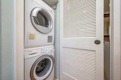 A tucked-away laundry nook with washer and dryer lets you vacation stress-free and laundry-ready KBV-12B3