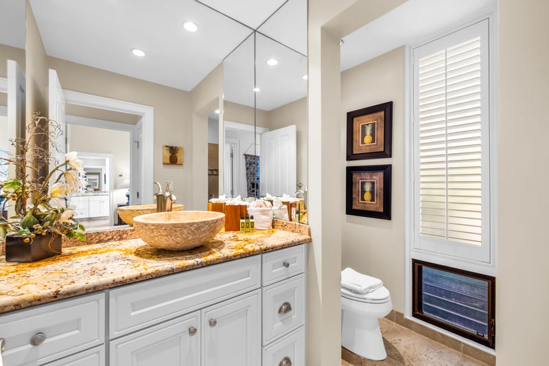 The half bath in the hallway offers convenience for everyone