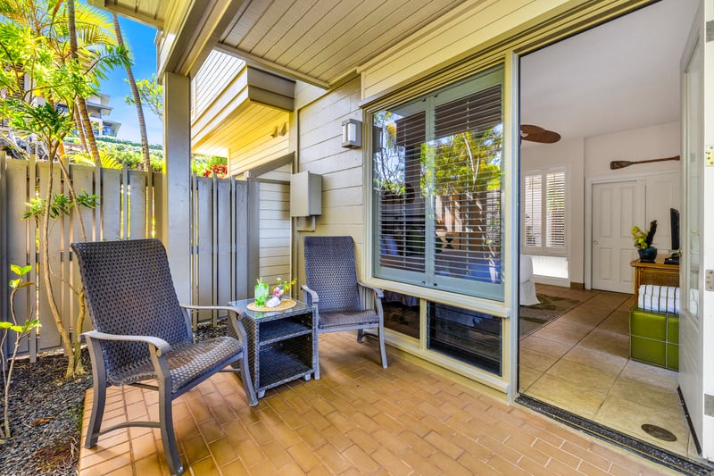 The guest bedroom features a cozy private lanai