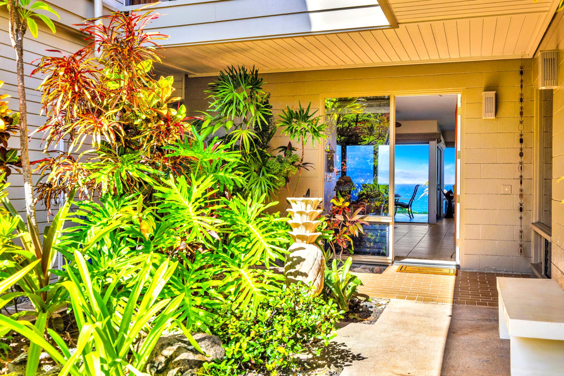 A lush garden welcomes you to your home away from home