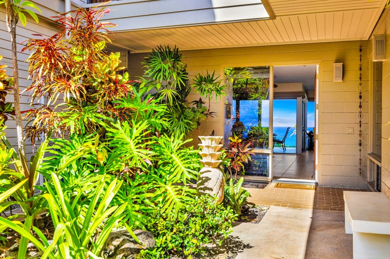 A lush garden welcomes you to your home away from home