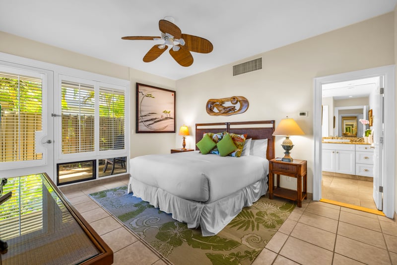 The welcoming guest bedroom is filled with natural light
