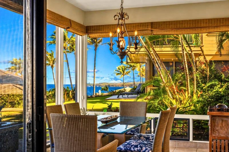 Dine outdoors with ocean breezes and tropical scenery