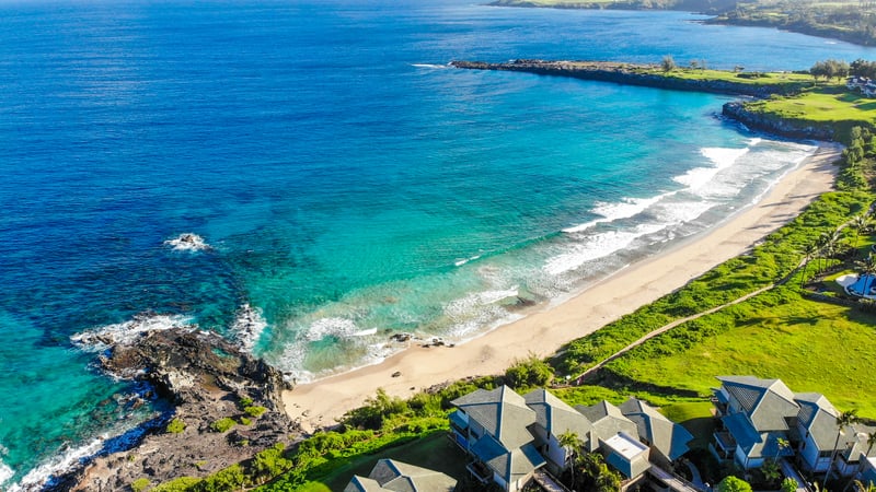 Panoramic views meet turquoise shores—discover serenity where the land kisses the sea  