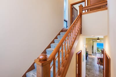 Elegant wooden stairs lead you into a light-filled, thoughtfully designed space KBV-15B3