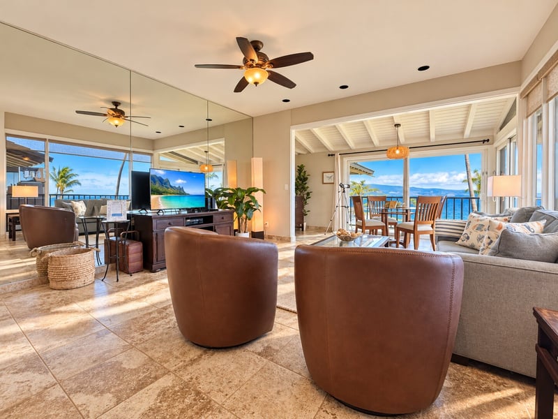 Swivel chairs face the television and mirrored wall, while the dining nook and ocean horizon stay in view across your living room. KBV-15B3
