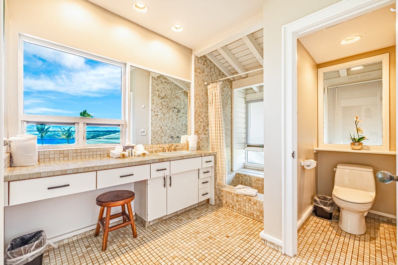Bask in bright natural light and ocean views as you refresh in this airy, spa-inspired bathroom retreat     
