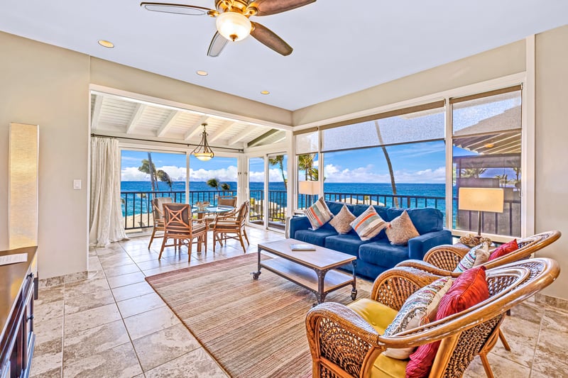 Island breezes meet homey ease in this artfully styled and view-filled living room     