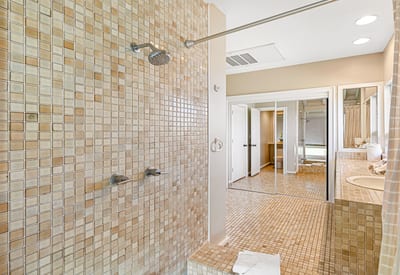 Indulge in a morning routine surrounded by mosaic tile, coastal charm, and sunlit elegance KBV-15B3