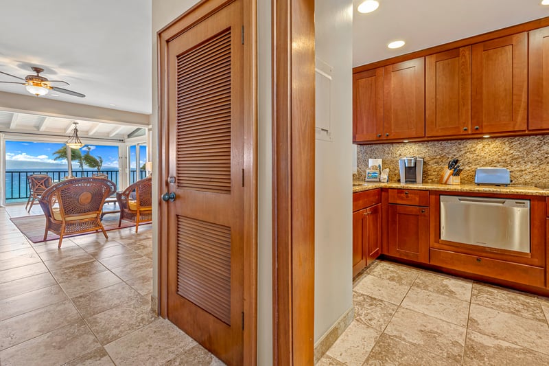 Warm wood tones meet stainless elegance in this upscale kitchen     