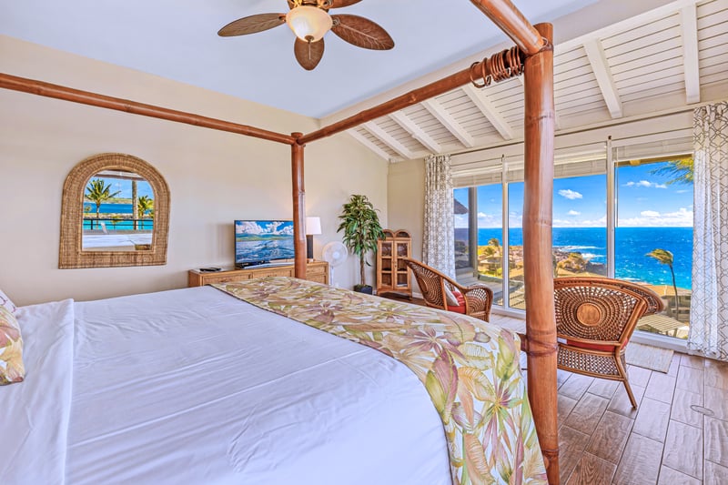 Indulge in paradise from this master suite with panoramic sea views and breezy private balcony comfort