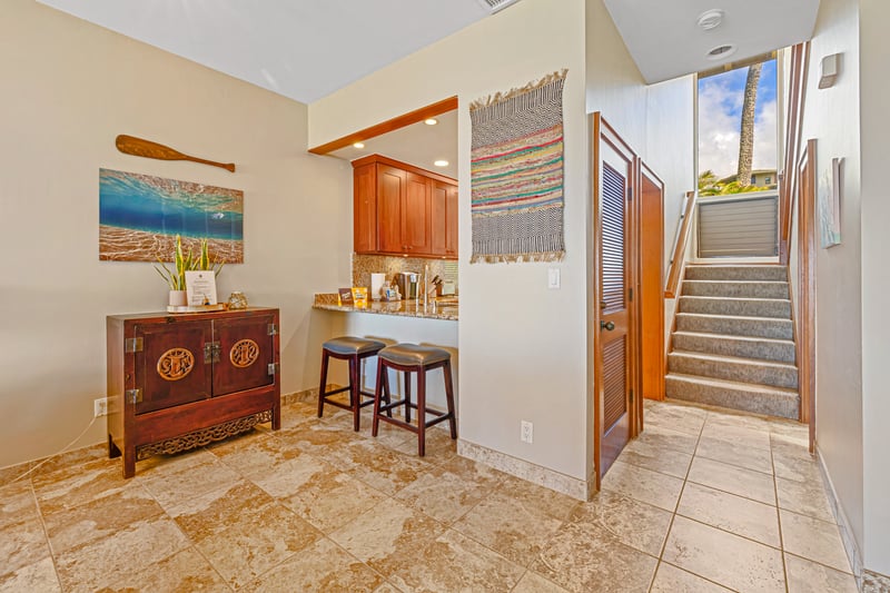Sunlit staircase welcomes you with warm tones and an inviting sense of home     