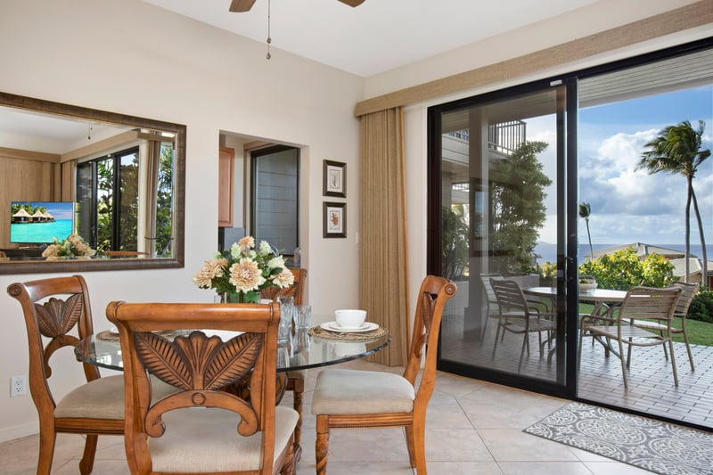 Set the table and open the sliding doors—this tropical dining room is made for sunny bites and breezy nights   