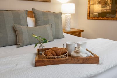 A little island magic, a lot of soft pillows, and the perfect excuse to cancel your plans and stay in