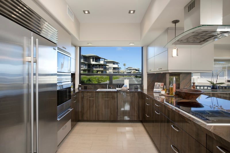 All the essentials, none of the clutter—this elegant kitchen keeps it stylish and stress-free, with natural light and stainless steel charm
