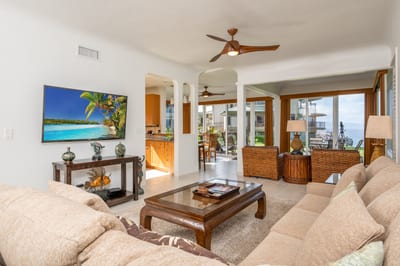 Stylish and serene, this living area invites you to unwind after a beach day with its cozy couch and open layout KBV-28G2