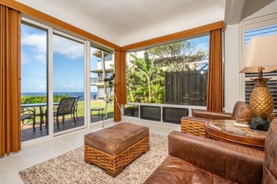Surround yourself with sun-kissed serenity and lush outdoor views in this warm and inviting lounge area KBV-28G2