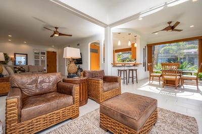 Chic leather seating and tropical wood accents create the perfect hideaway with front-row garden and ocean views KBV-28G2