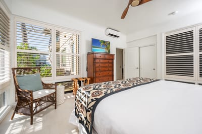 A perfect blend of light, texture, and warmth makes this bedroom your own peaceful oasis by the sea KBV-28G2