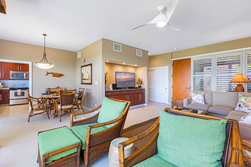 Comfort meets charm in this airy space with warm wood accents and plush, colorful seating KBV-30G2