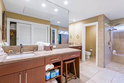 From custom wood finishes to polished tile, this bath area brings calm and craftsmanship together