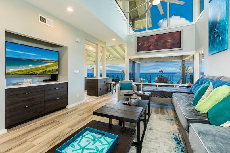 Every inch of this sleek, modern space is bathed in natural light and cooled by ocean breezes and ceiling fans